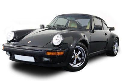 A close-up of a classic black Porsche car against a white background.